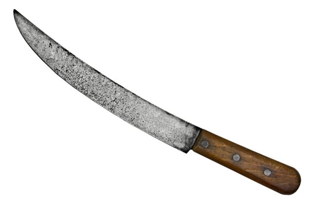 vintage scimitar knife on white background